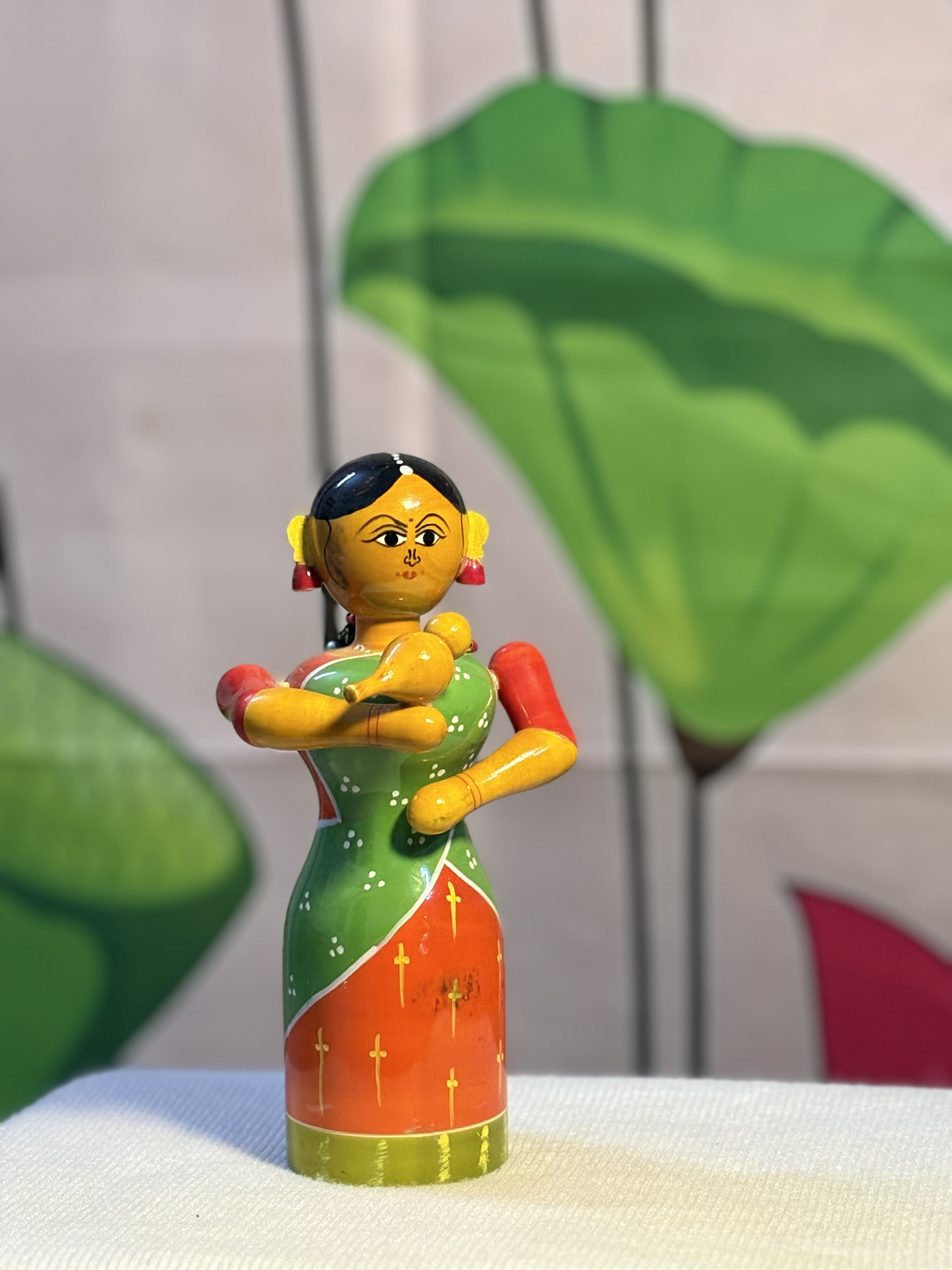 Elegant Village Woman with Bird